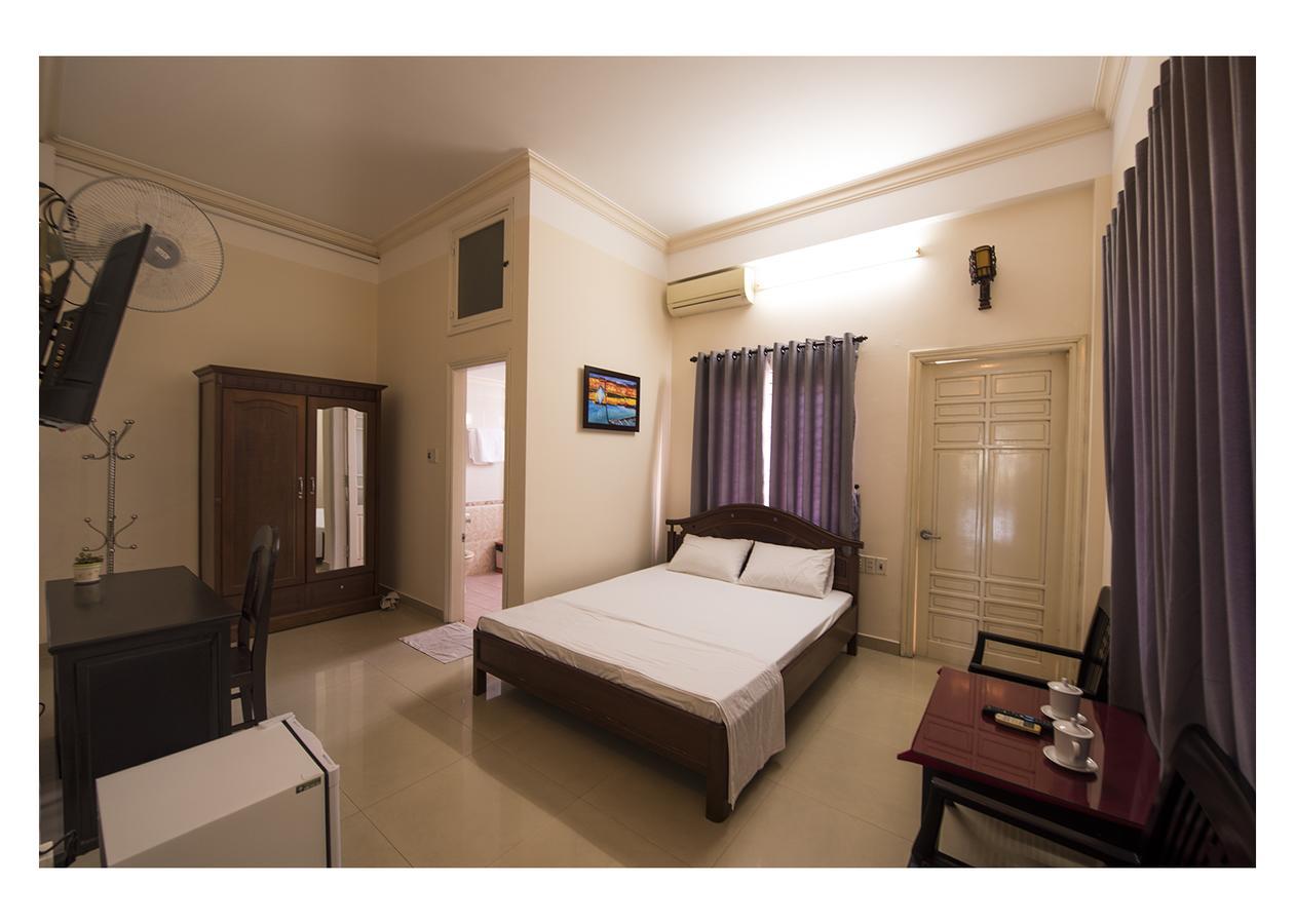 Three Palms Homestay Хойан Экстерьер фото